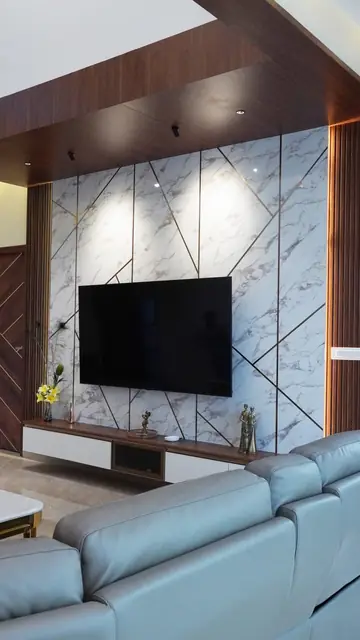 Marble-clad television wall with panelling - Mrs. Anitha project, Bangalore
