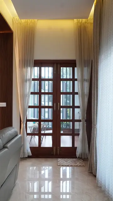 Glazed double doors at end of passage - Mrs. Anitha project, Bangalore