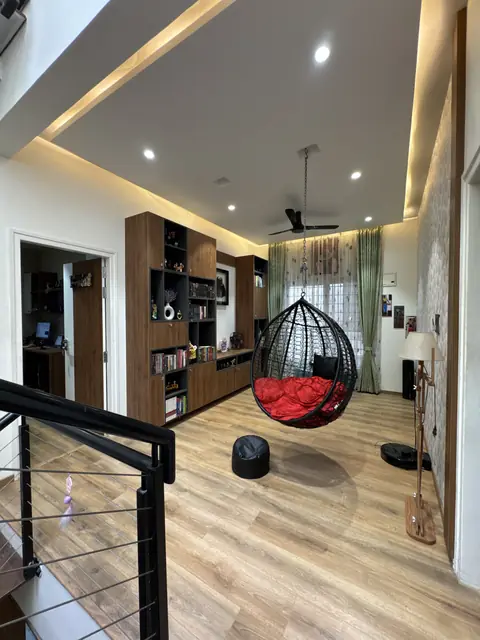 Living area shelving viewed from stair landing - Ms. Rashmi project, Bangalore