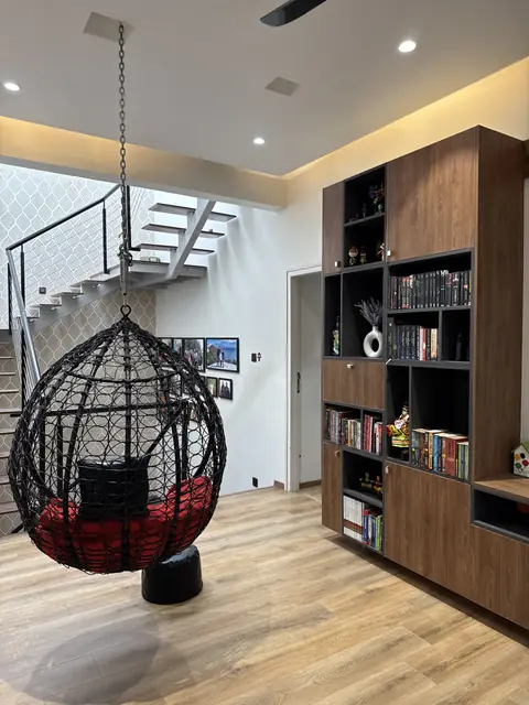 Double-height living space with open staircase - Ms. Rashmi project, Bangalore