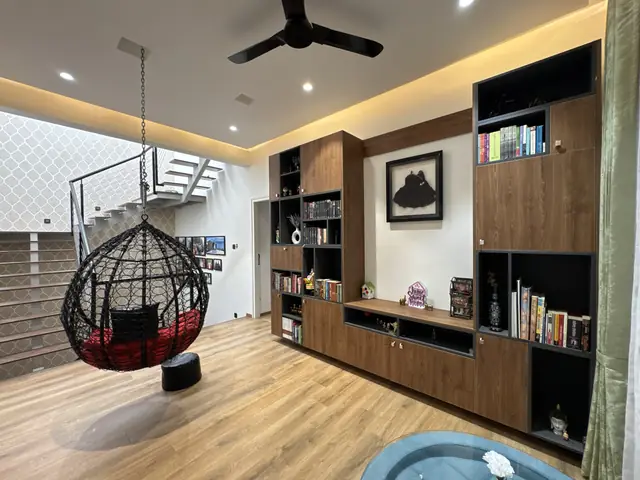 Wide living view with television and shelving - Ms. Rashmi project, Bangalore