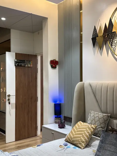Bedroom corner with panelled doorway and lighting - Ms. Rashmi project, Bangalore