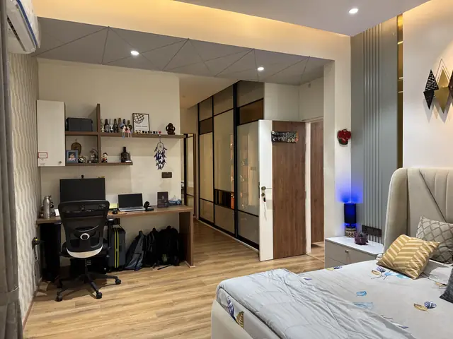 Bedroom with sliding wardrobe and study corner - Ms. Rashmi project, Bangalore