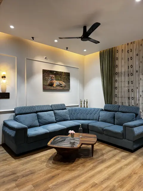 Living room with sectional sofa and fan - Ms. Rashmi project, Bangalore