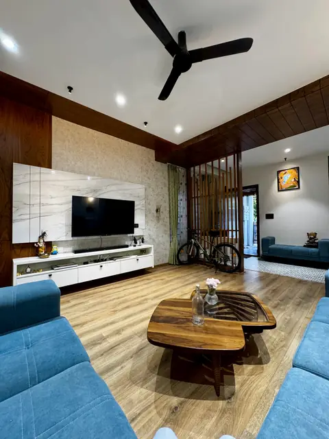 Living room seating facing television console - Ms. Rashmi project, Bangalore