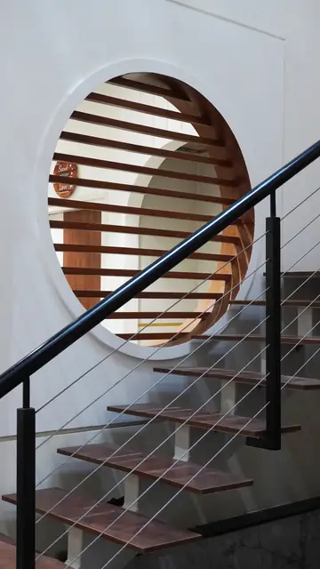 Circular louvred opening framing timber treads - Ms. Rashmi project, Bangalore